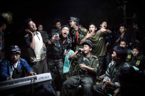 1st Prize Daily Life Single Julius Schrank, Germany, De Volkskrant 15 March 2013, Burma Kachin Independence Army fighters are drinking and celebrating at a funeral of one of their commanders who died the day before. The city is under siege by the Burmese army.