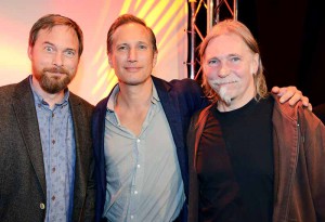 Preisträger Kai Wortmann und Peter Fotheringham (sweetSixteen) mit Pate Benno Fürmann (Mitte) © Foto: Anna Kaduk, Film- und Medienstiftung NRW