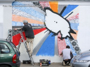 Mauer Galerie, Streetart 2015 in der Weißenburger Straße am Kraftwerk. Sprayer aus Castrop-Rauxel am Werk