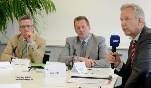 Bundesinnenminister Thomas de Maizière (CDU), der CDU-Abgeordnete Thomas Hoffmann und Polizeipräsident Gregor Lange beschäftigten sich in Dortmund mit dem Thema Rechtsextremismus.