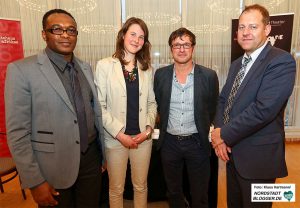 Diskussion über den globalen Rohstoffhandel im Rathaus. V.l.: Dr. Phil Médard Kabanda, Johanna Sydow, Vincent Neussl, Mathias Baier