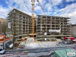 Mitten in der City realisiert der Spar- und Bauverein einen großen Wohn und Geschäftskomplex.