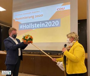 Social Distancing in Zeiten von Corona - da gibt es die Blumen dann am Stab gereicht. 