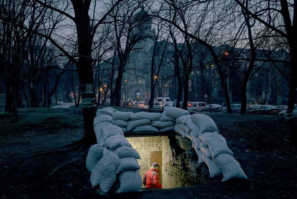 A man enters an air raid shelter in Ivan Franko Park in Lviv, Ukraine, Europe on March 15, 2022. Since the Russian bombing of a military training center near Lviv, there have been air raid alerts several times a day. In addition to loudspeakers and sirens in the city, the alert is communicated via Apps and Telegram groups.