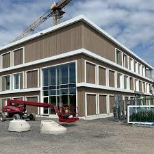 Das Leuchtturmprojekt der Architekten der a|sh GmbH mit Superwood-Fassade