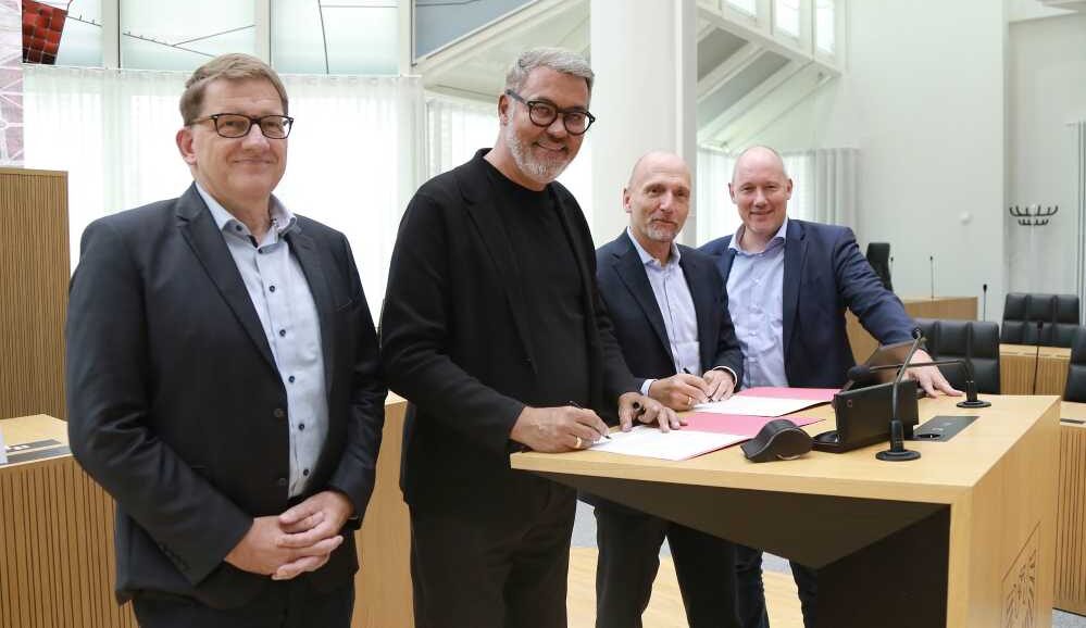Jörg Zilian, Thomas Westphal, Prof. Dr. Volker Gruhn und Christian Uhr