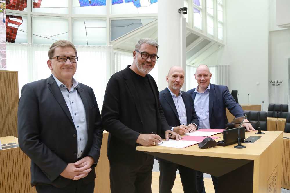 Jörg Zilian, Thomas Westphal, Prof. Dr. Volker Gruhn und Christian Uhr