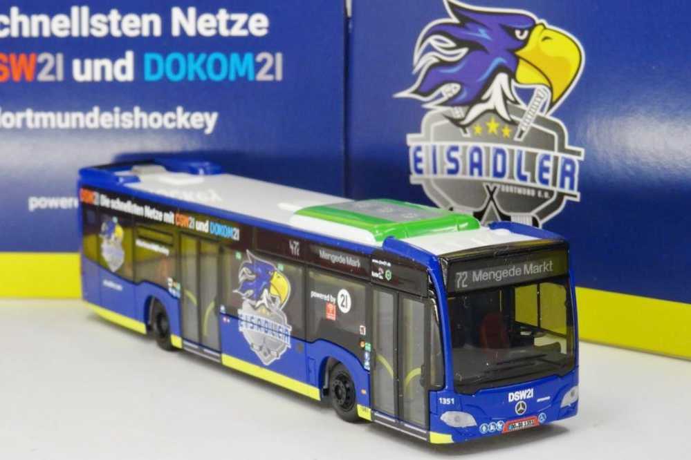Miniatur Bus mit blau gelbem Design
