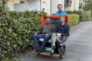 Personen beim Rikscha fahren