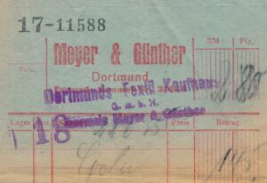 Beleg des Kaufhauses Meyer & Günther, der mit Dortmunds Textil Kaufhaus überstempelt wurde.